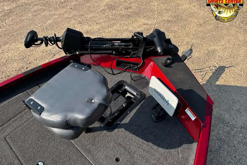Slide: The Image of 2020 Lowe Stinger 175C boat with Garmin equipment and seating on a textured deck. - 8