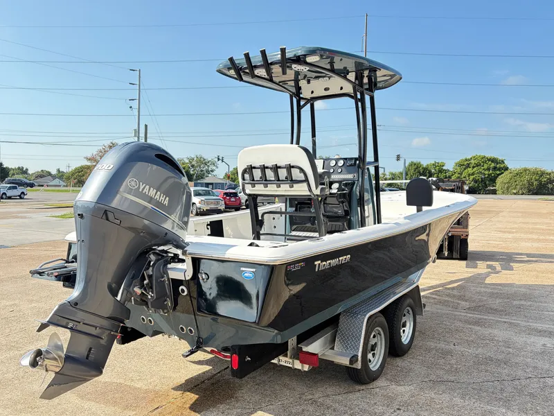 Slide: The Image of A 2021 Tidewater 2210 Carolina Bay boat with Yamaha outboard motor on a trailer. - 4