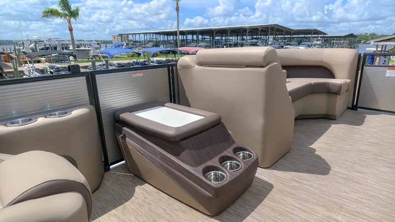 Slide: The Image of The image shows the luxurious interior of a 2022 Bennington 22 LSB with comfortable seating. - 7
