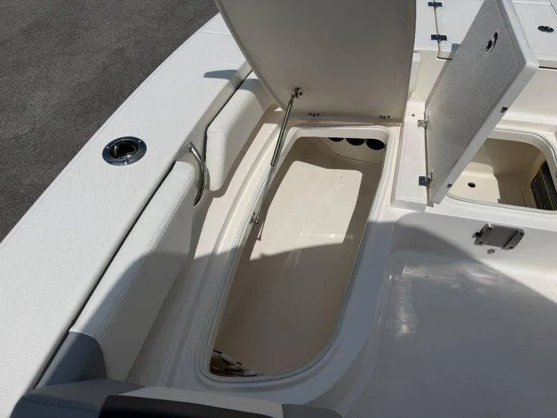 Slide: The Image of 2023 Robalo 246 Cayman featuring spacious storage and sturdy design, perfect for fishing trips. - 47