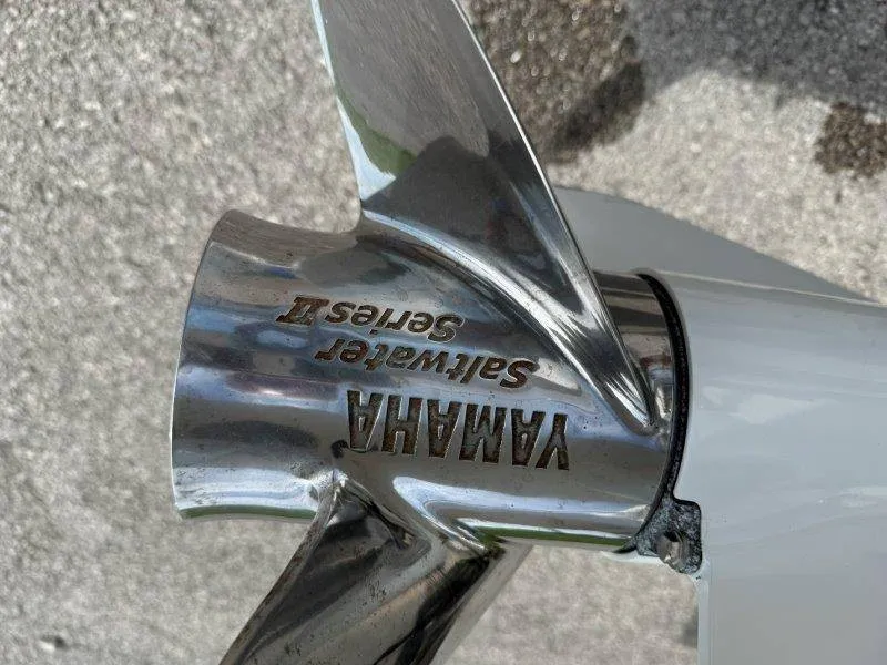 Slide: The Image of Close-up of a Yamaha saltwater propeller on a boat. - 14