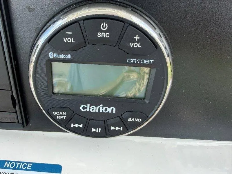 Slide: The Image of Clarion Bluetooth audio panel on a Robalo 246 Cayman boat. - 40