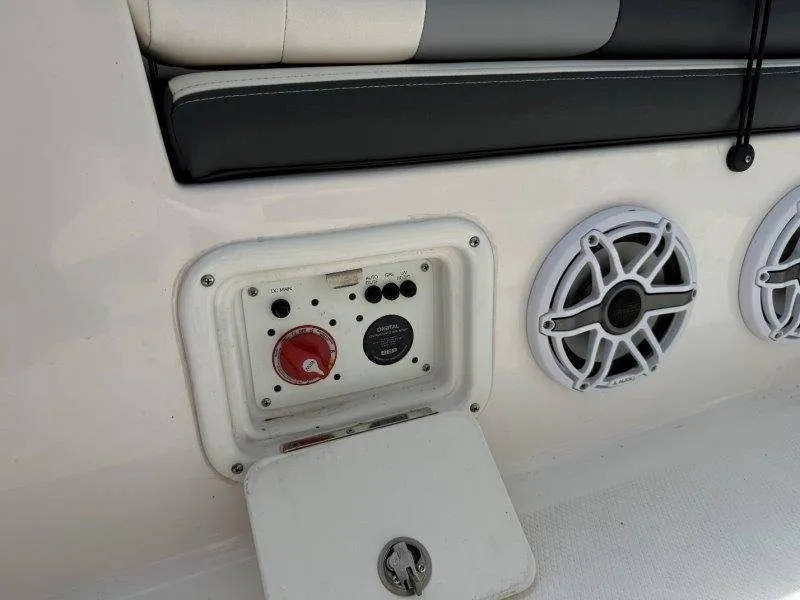 Slide: The Image of Close-up of a control panel with speakers on a boat. - 35