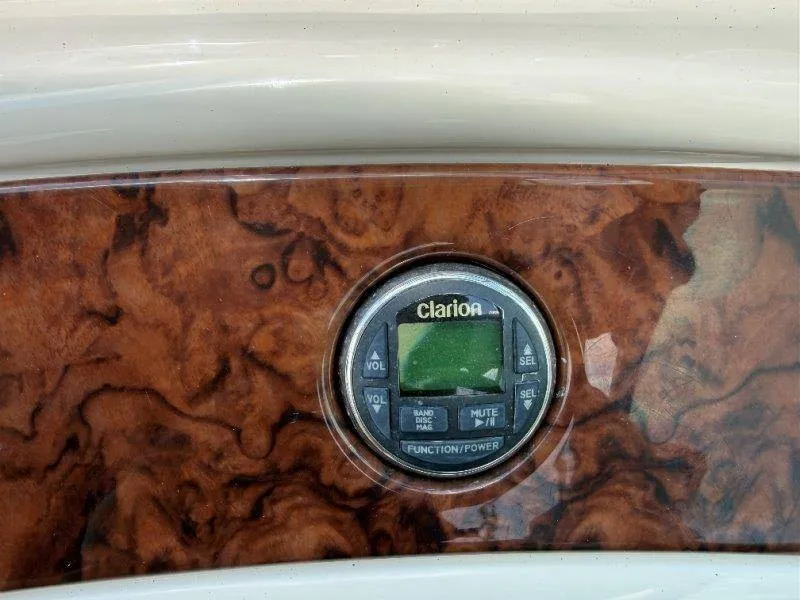 Slide: The Image of Close-up of a Clarion audio system in a 2003 Sea Ray 240 Sundeck. - 17