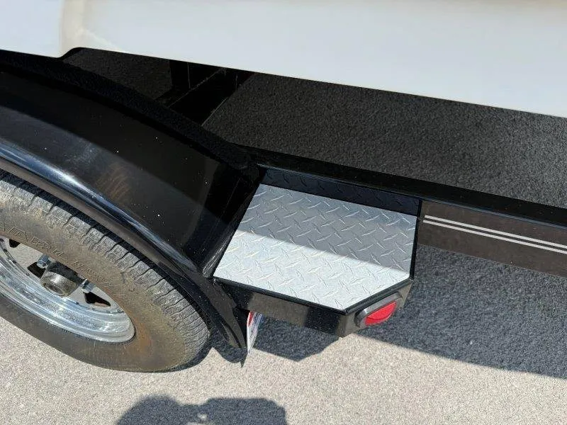 Slide: The Image of Close-up of a boat trailer with a non-slip step and a wheel with a chrome rim. - 15