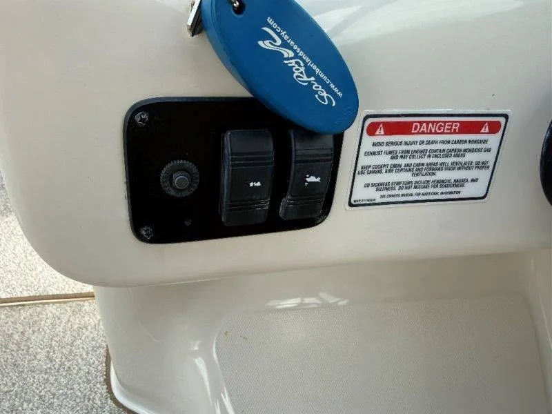 Slide: The Image of Close-up of switches and a warning label on a boat. - 40