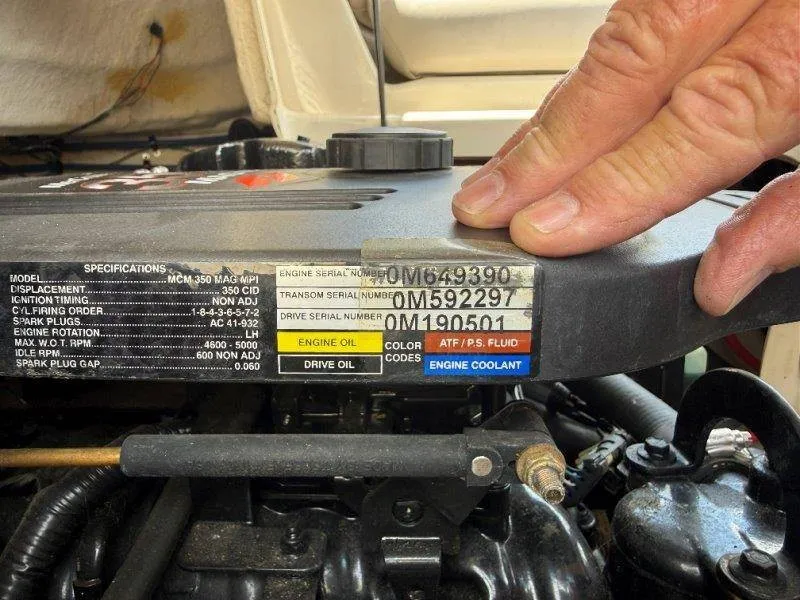 Slide: The Image of Close-up of an engine compartment with technical details and serial numbers. - 29