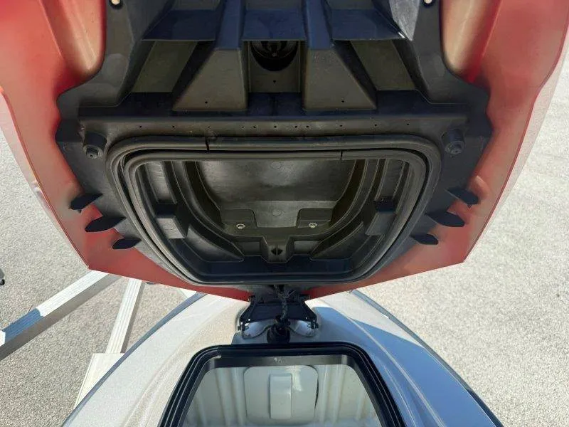 Slide: The Image of Close-up of an open storage compartment on a Sea-Doo jet ski, showing the interior. - 17