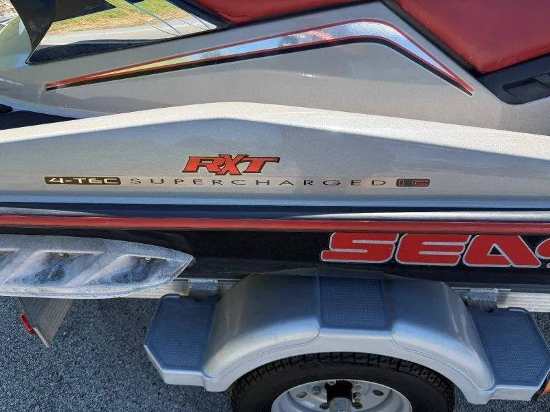 Slide: The Image of Close-up of a Sea-Doo RXT SC jet ski with supercharged logo, mounted on a trailer. - 7