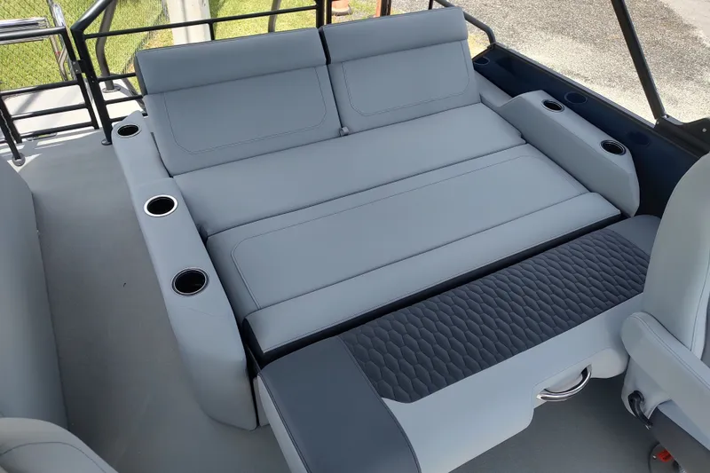 Slide: The Image of Luxurious seating area in 2027 Sylvan X1 ULZ boat with cup holders and modern design. - 3
