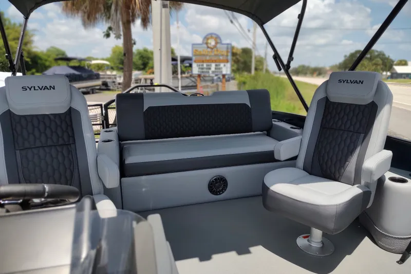 Slide: The Image of 2027 Sylvan X1 ULZ boat interior with plush seating and modern design. - 6
