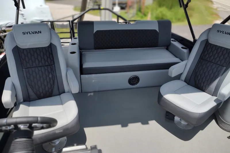Slide: The Image of Interior of 2027 Sylvan X1 ULZ boat with modern seating and steering wheel. - 8