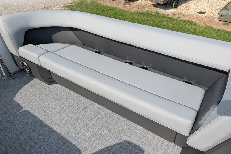 Slide: The Image of 2027 Sun Tracker Party Barge 18 DLX pontoon boat seating area with cup holders. - 14
