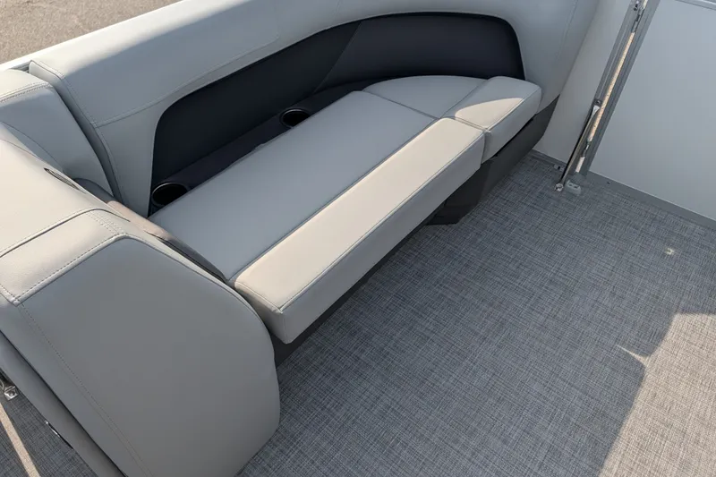 Slide: The Image of 2027 Sun Tracker Party Barge 18 DLX interior seating with cup holders. - 15