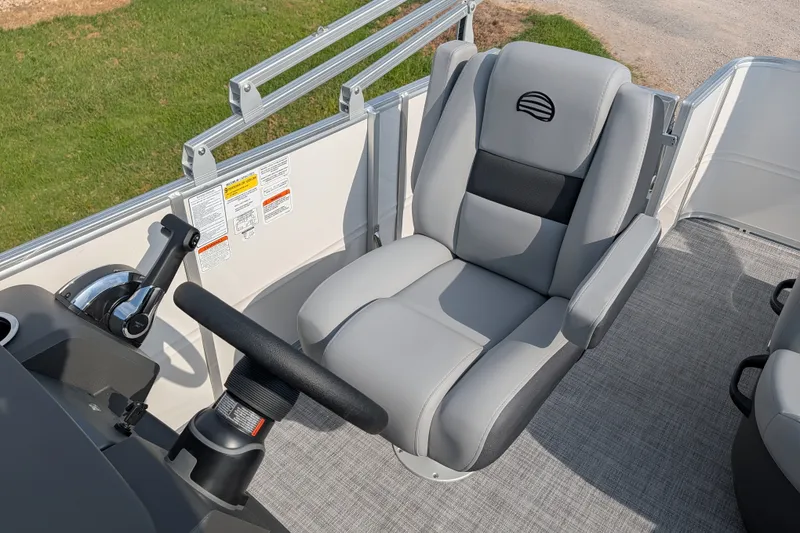 Slide: The Image of Captain's seat and controls on 2027 Sun Tracker Party Barge 18 DLX pontoon boat. - 20
