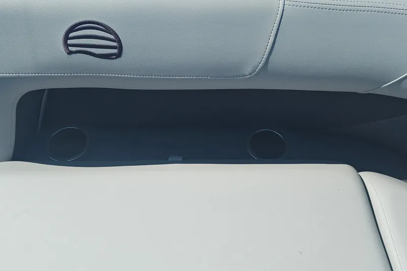 Slide: The Image of Interior seating of 2027 Sun Tracker Party Barge 16 DLX with cup holders. - 18