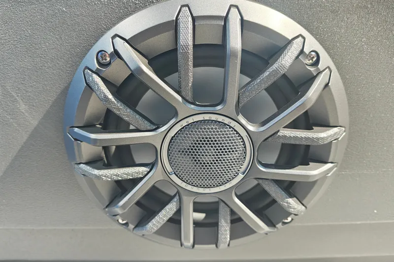 Slide: The Image of Close-up of a speaker on a 2027 Sun Tracker Party Barge 16 DLX. - 19