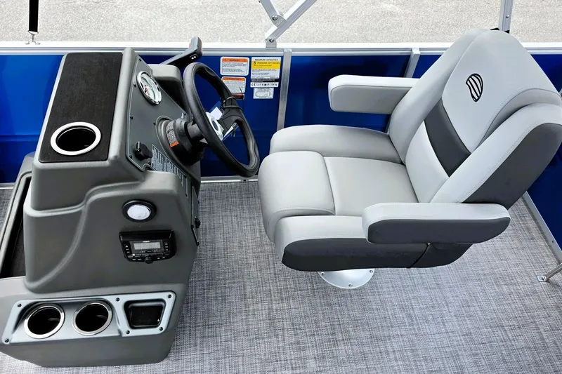 Slide: The Image of Captain's chair and helm of 2027 Sun Tracker Party Barge 16 DLX pontoon boat. - 13