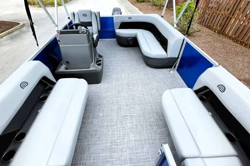 Slide: The Image of 2027 Sun Tracker Party Barge 16 DLX interior with spacious seating and modern design. - 15