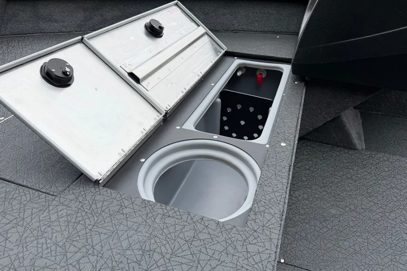 Slide: The Image of 2027 Tracker Pro Guide V-16 SC boat storage compartments and livewell interior view. - 20