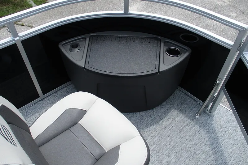 Slide: The Image of 2027 Sun Tracker Fishin' Barge 20 DLX interior with seating and storage area. - 14
