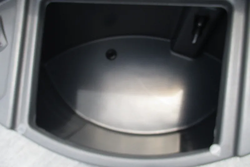 Slide: The Image of Storage compartment of 2027 Sun Tracker Fishin' Barge 20 DLX boat. - 16