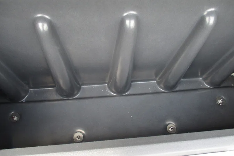 Slide: The Image of Interior view of 2027 Sun Tracker Fishin' Barge 20 DLX storage compartment. - 20