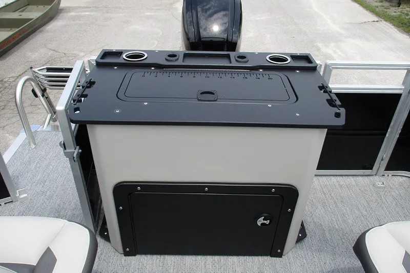 Slide: The Image of 2027 Sun Tracker Fishin' Barge 20 DLX fishing station with storage and cup holders. - 30