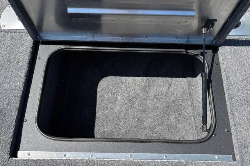 Slide: The Image of Open storage compartment in 2027 Tracker Pro Team 175 Crappie Edition boat. - 36