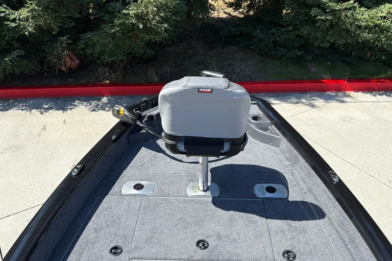 Slide: The Image of 2027 Tracker Pro Team 175 Crappie Edition boat with seating and fishing setup. - 18