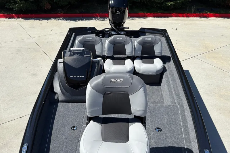 Slide: The Image of 2027 Tracker Pro Team 175 Crappie Edition boat with gray seating and sleek design. - 15
