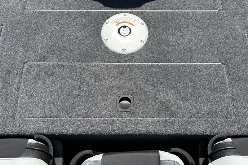 Slide: The Image of 2027 Tracker Pro Team 175 Crappie Edition boat deck with gray carpet and seat mounts. - 41