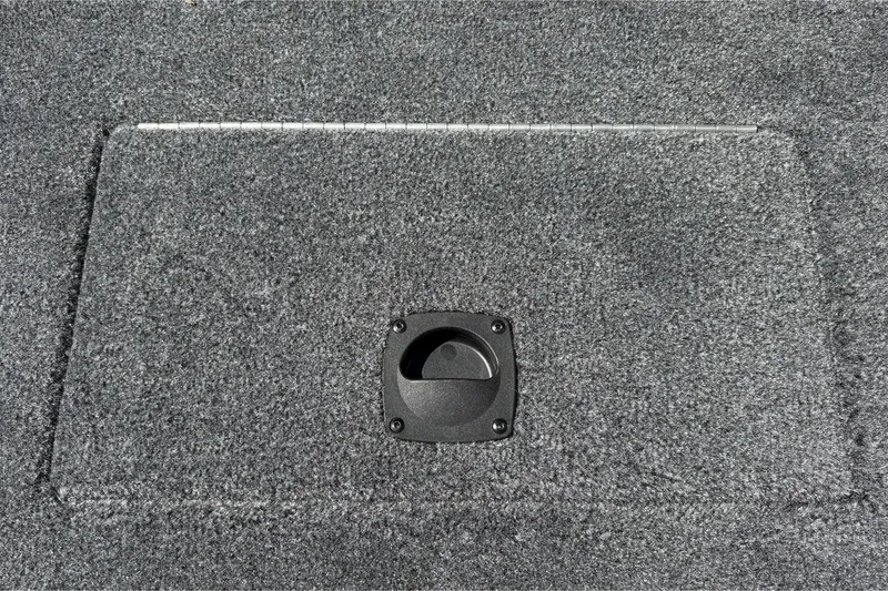 Slide: The Image of Carpeted deck of 2027 Tracker Pro Team 175 Crappie Edition boat with hatch handle. - 45