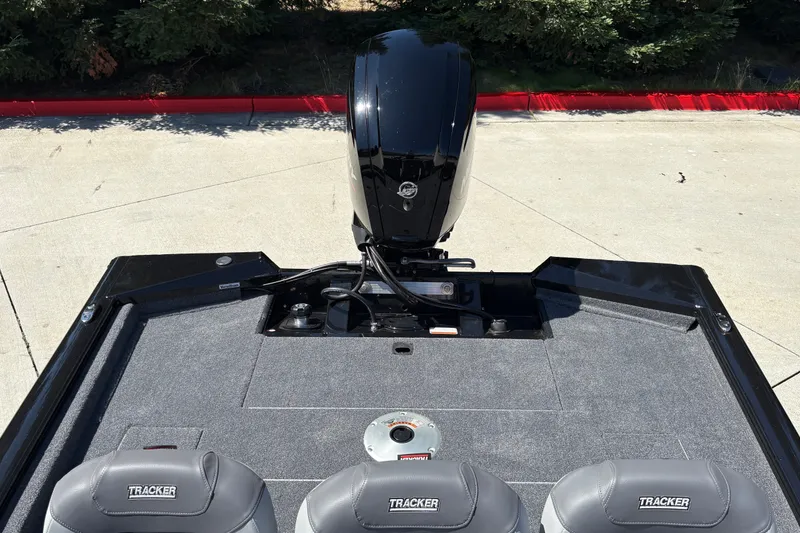 Slide: The Image of 2027 Tracker Pro Team 175 Crappie Edition boat with motor and seating. - 30