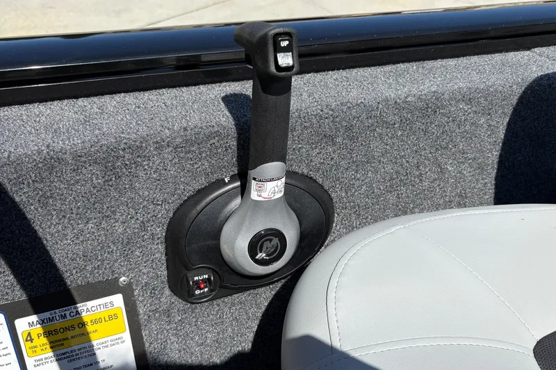 Slide: The Image of Throttle control of 2027 Tracker Pro Team 175 Crappie Edition boat, with capacity label. - 26