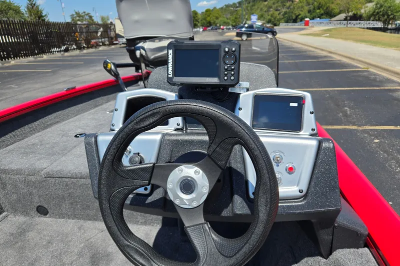 Slide: The Image of Steering console of 2027 Tracker Pro Team 175 Crappie Edition boat with navigation system. - 14