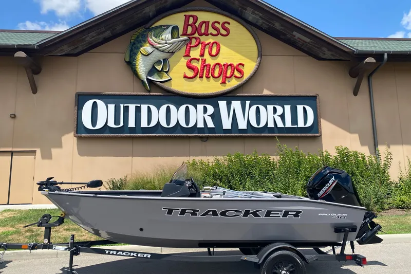 The Image of 2027 Tracker Pro Guide V-16 SC boat displayed at Bass Pro Shops Outdoor World. - 0