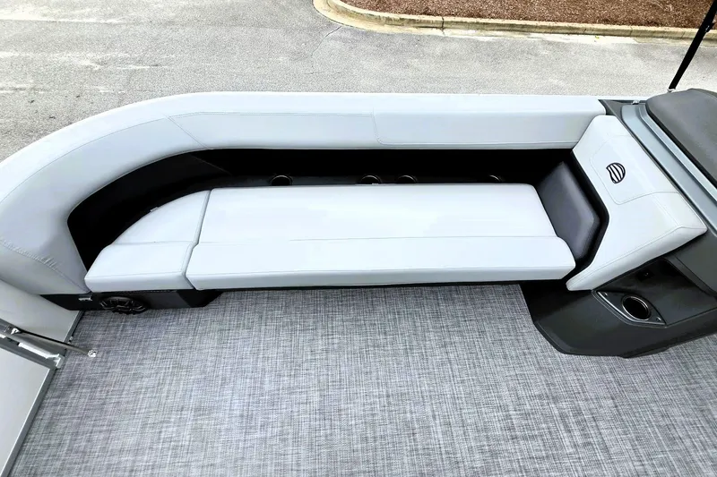 Slide: The Image of 2027 Sun Tracker Party Barge 18 DLX interior with sleek seating and modern design. - 19