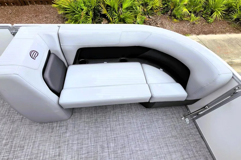 Slide: The Image of 2027 Sun Tracker Party Barge 18 DLX pontoon boat with plush seating and modern design. - 18