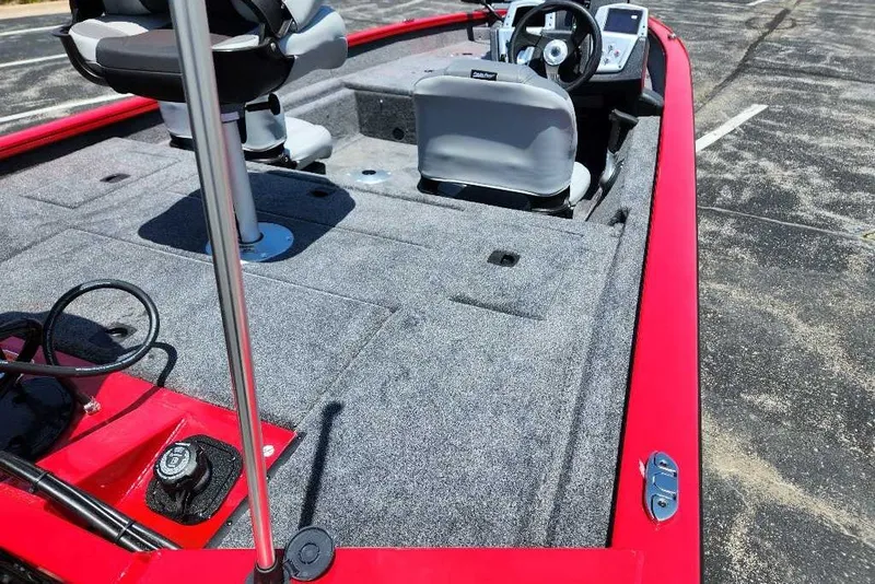 Slide: The Image of 2027 Tracker Pro Team 175 Crappie Edition boat interior with red trim and seating. - 18