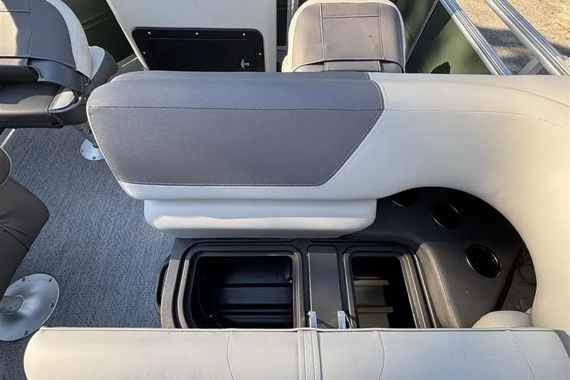 Slide: The Image of Interior seating and storage of 2027 Sun Tracker Fishin' Barge 20 DLX pontoon boat. - 29