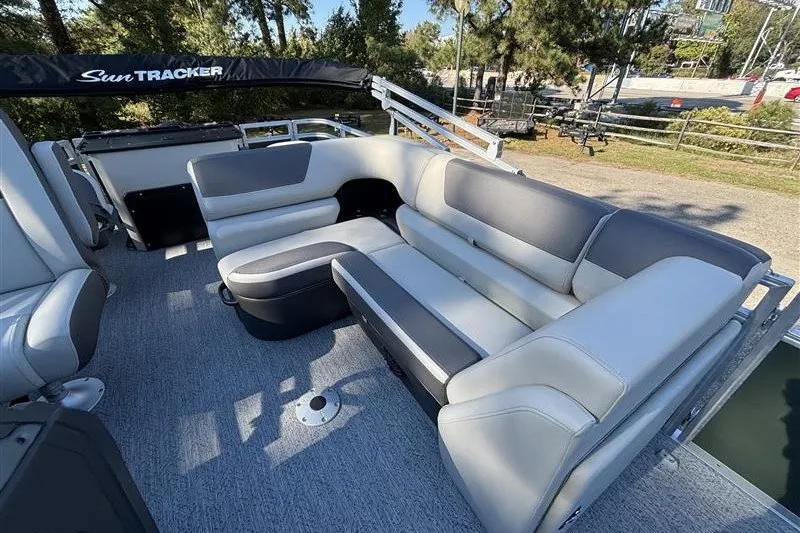 Slide: The Image of 2027 Sun Tracker Fishin' Barge 20 DLX with spacious seating and modern design. - 27