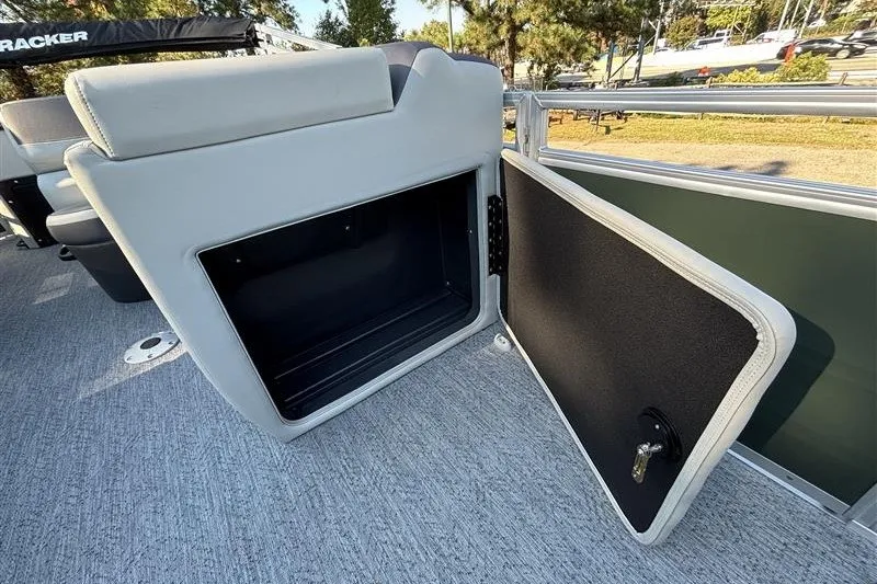 Slide: The Image of Open storage compartment on 2027 Sun Tracker Fishin' Barge 20 DLX pontoon boat. - 19