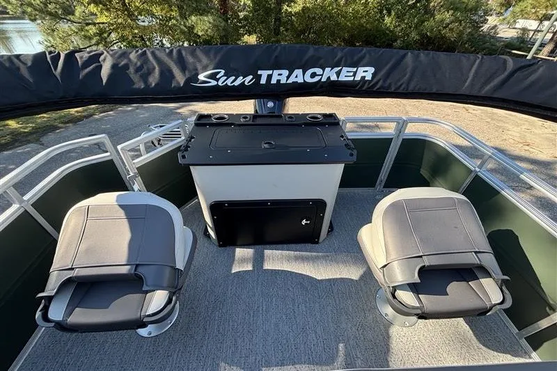 Slide: The Image of 2027 Sun Tracker Fishin' Barge 20 DLX interior with seating and console. - 32