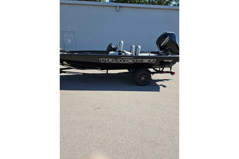 The Image of 2027 Tracker Pro Team 175 Crappie Edition boat on trailer, side view. - 0