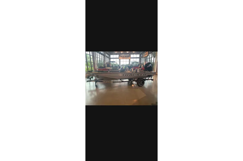 The Image of 2027 Tracker Pro Team 175 Crappie Edition boat displayed indoors. - 0