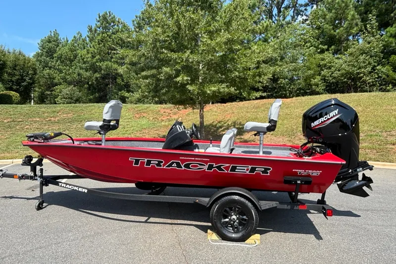 The Image of 2027 Tracker Pro Team 175 Crappie Edition boat with Mercury engine, parked outdoors. - 0
