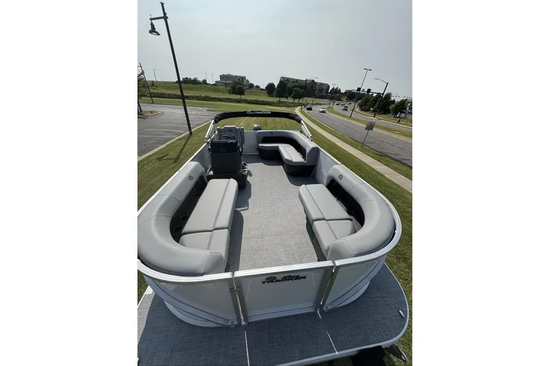 Slide: The Image of 2027 Sun Tracker Party Barge 16 DLX pontoon boat with spacious seating and modern design. - 12