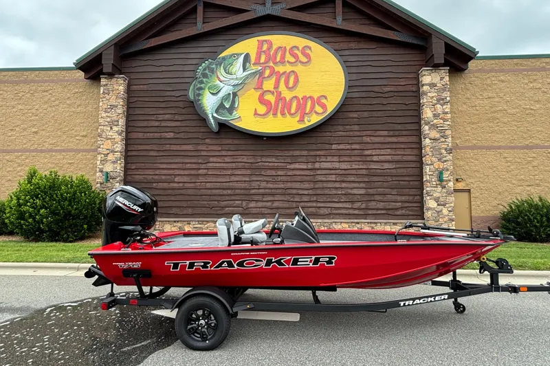 The Image of 2027 Tracker Pro Team 175 Crappie Edition boat at Bass Pro Shops entrance. - 0