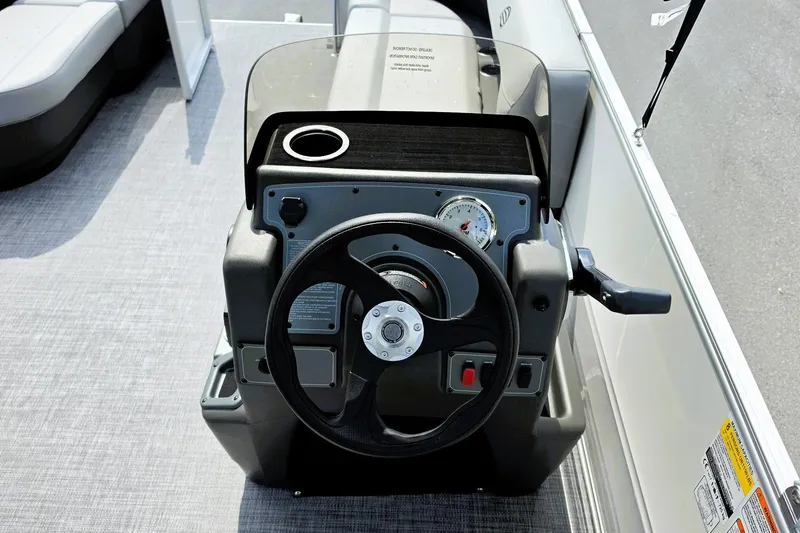 Slide: The Image of Steering console of 2027 Sun Tracker Party Barge 16 DLX pontoon boat. - 12